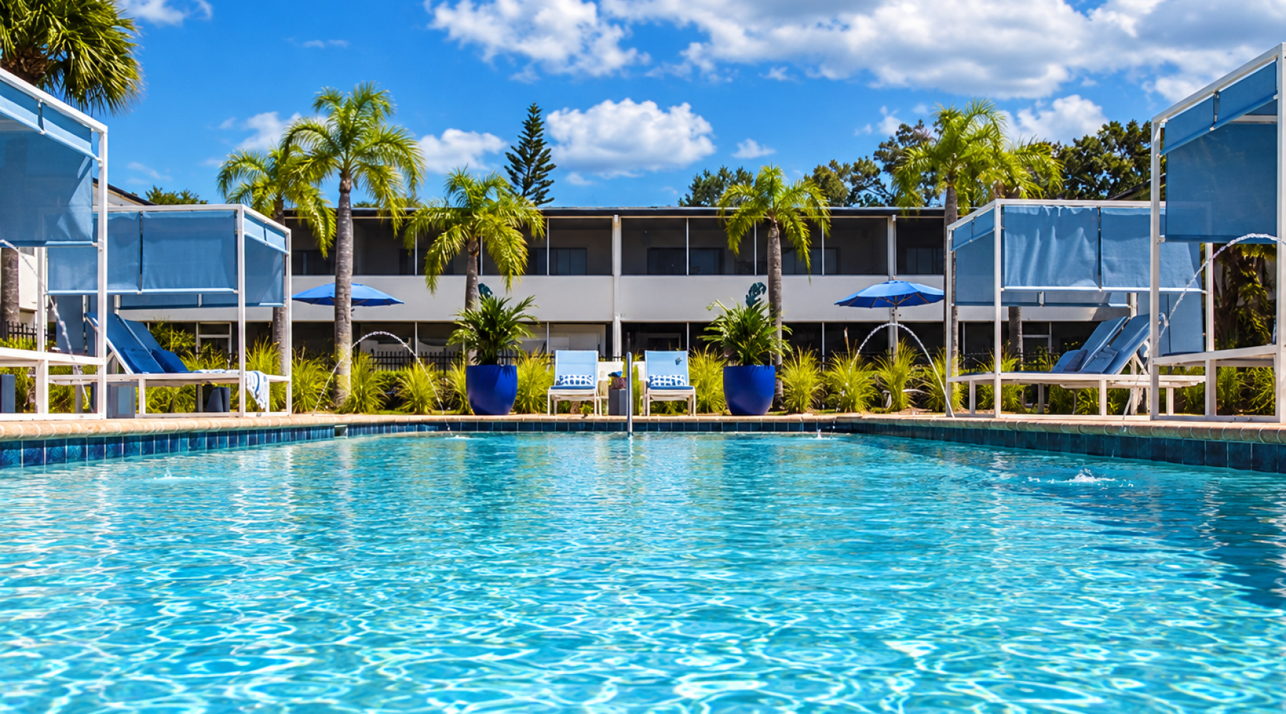 Two Resort-inspired Pools with Cabanas and Daybeds
